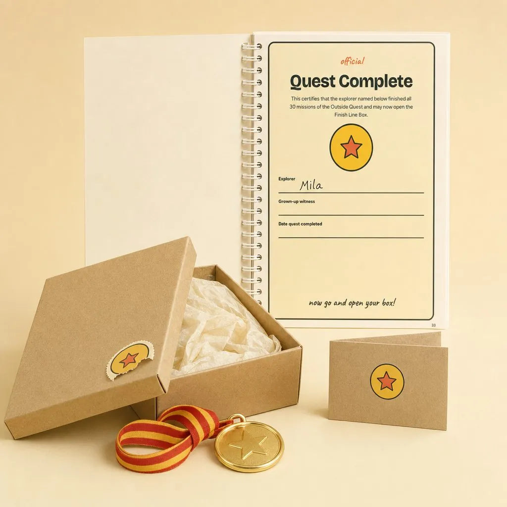 The Finish Line Box opened: a gold medal and a secret mission card, next to the Quest Complete certificate